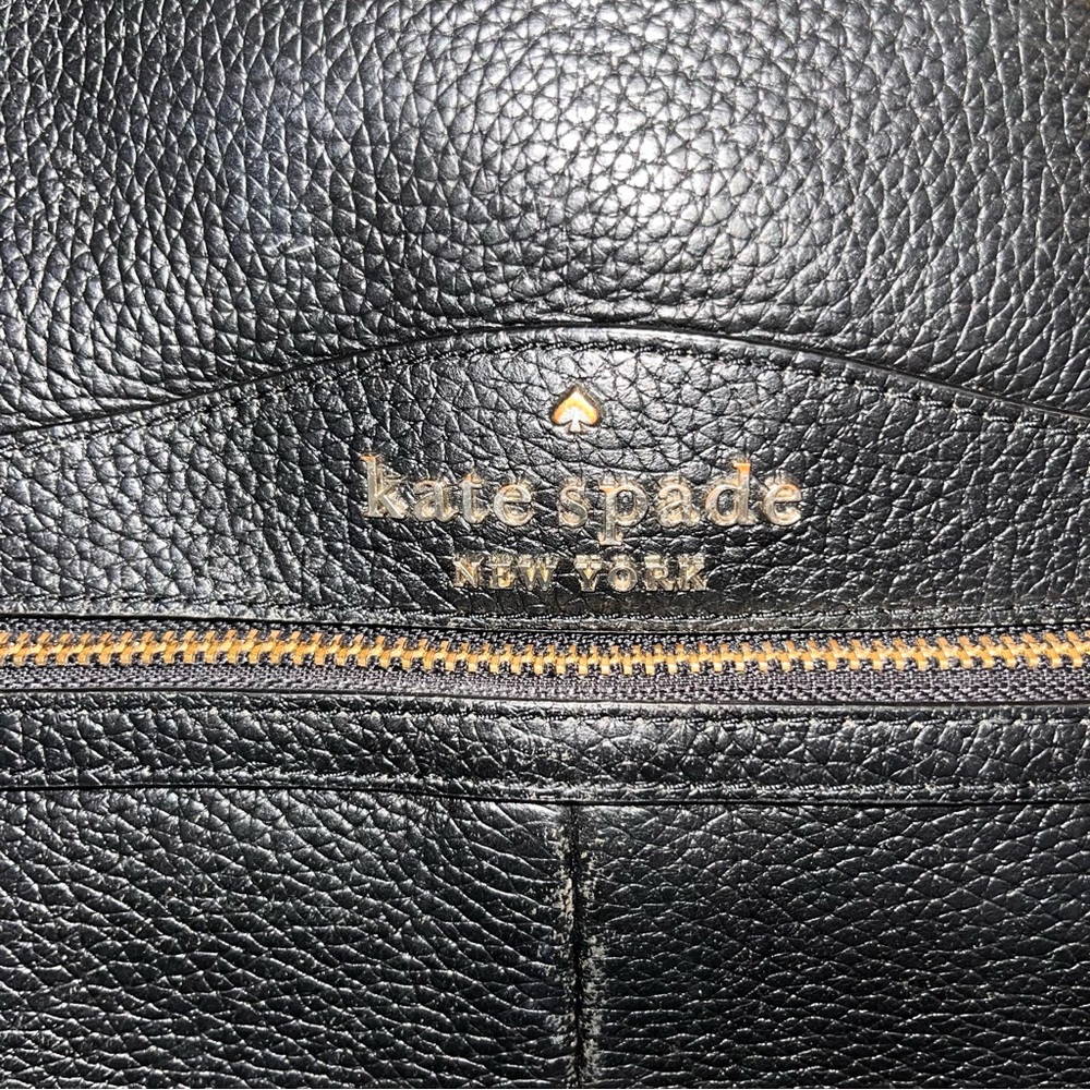 kate spade black leather mini backpack with gold-tone logo and zipper